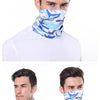 A man wearing a blue and white camouflage face mask for sun protection.