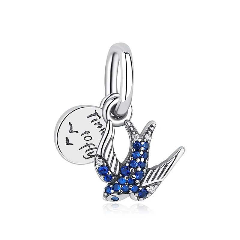 A silver family tree charm necklace featuring a leaf design and a tag engraved with the words Timothy and Family