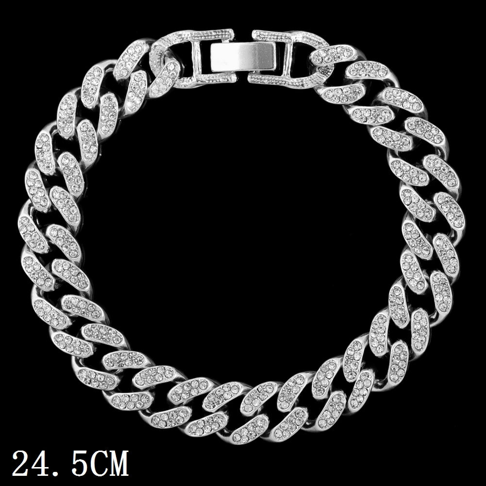 Silver crystal Cuban link anklet bracelet with a rectangular clasp shown against a black background.
