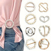 A collection of elegant rhinestone and pearl decorative button clips in various shapes and finishes.