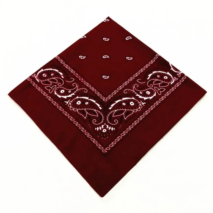A deep maroon patterned bandana scarf folded into a diamond shape.