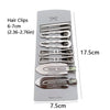 A set of vintage silver Y2K metal hair clips with various sizes displayed on a white background.