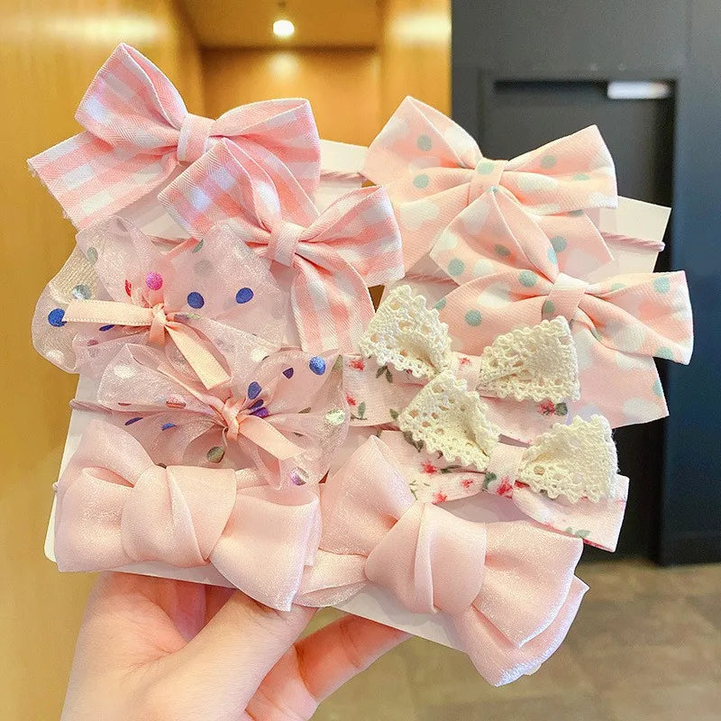 Pink and white sheer fabric flower bow hair ties for girls