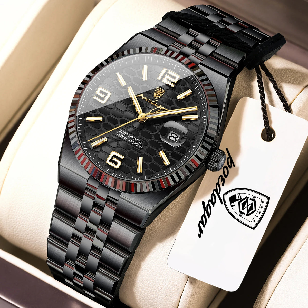 A black and silver watch is displayed in a box with a white card, featuring the brand name on the watch face.