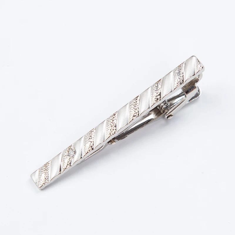 Silver metal tie clip featuring a textured, striped design for men's neckties.