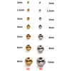A collection of stainless steel spacer beads in various sizes and finishes, including gold-toned and silver-toned options.