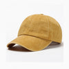 A tan washed cotton snapback cap shown from the side.