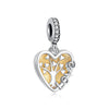 A silver heart pendant charm featuring a detailed family tree design with small leaves.