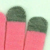 A pair of pink and gray knit touch screen gloves showing the textured fabric and color contrast.