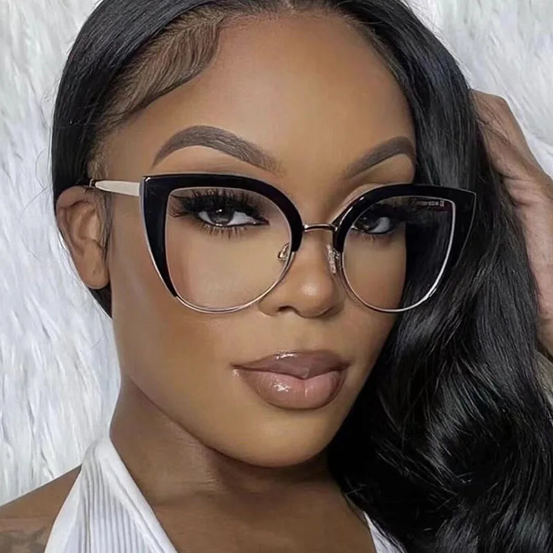 A close-up photo of a woman wearing black vintage metal cat eye anti-blue light eyeglasses.