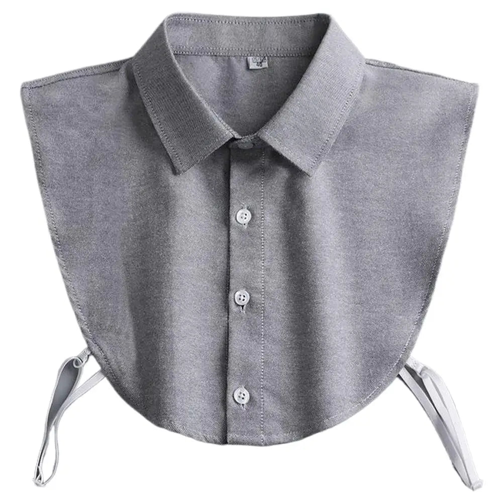 A grey detachable decorative collar for shirts and sweaters shown flat.