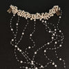 Elegant rhinestone bridal headband with pearl strands and dangling beads