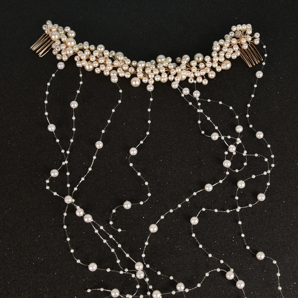 Elegant rhinestone bridal headband with pearl strands and dangling beads