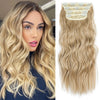 Close-up of a woman modeling long, wavy blonde hair with synthetic ombre clips.