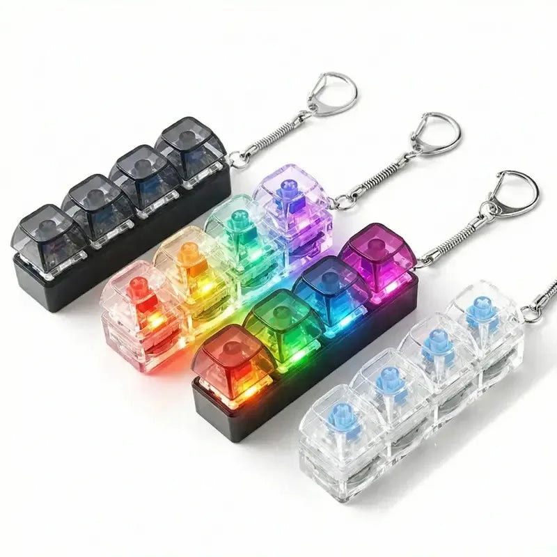 A set of clickable LED fidget keychains featuring various colored lights and a keyboard layout.