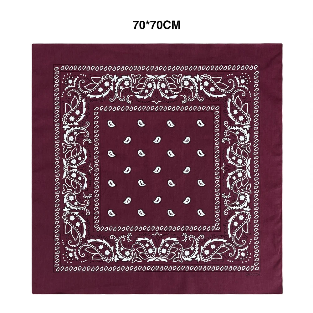A deep maroon square bandana scarf with white paisley and geometric embroidery.