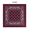 A deep maroon square bandana scarf featuring intricate white paisley embroidery and decorative borders.