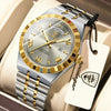 A silver and gold men's luminous quartz wristwatch with a leather strap is displayed in a light-colored box.