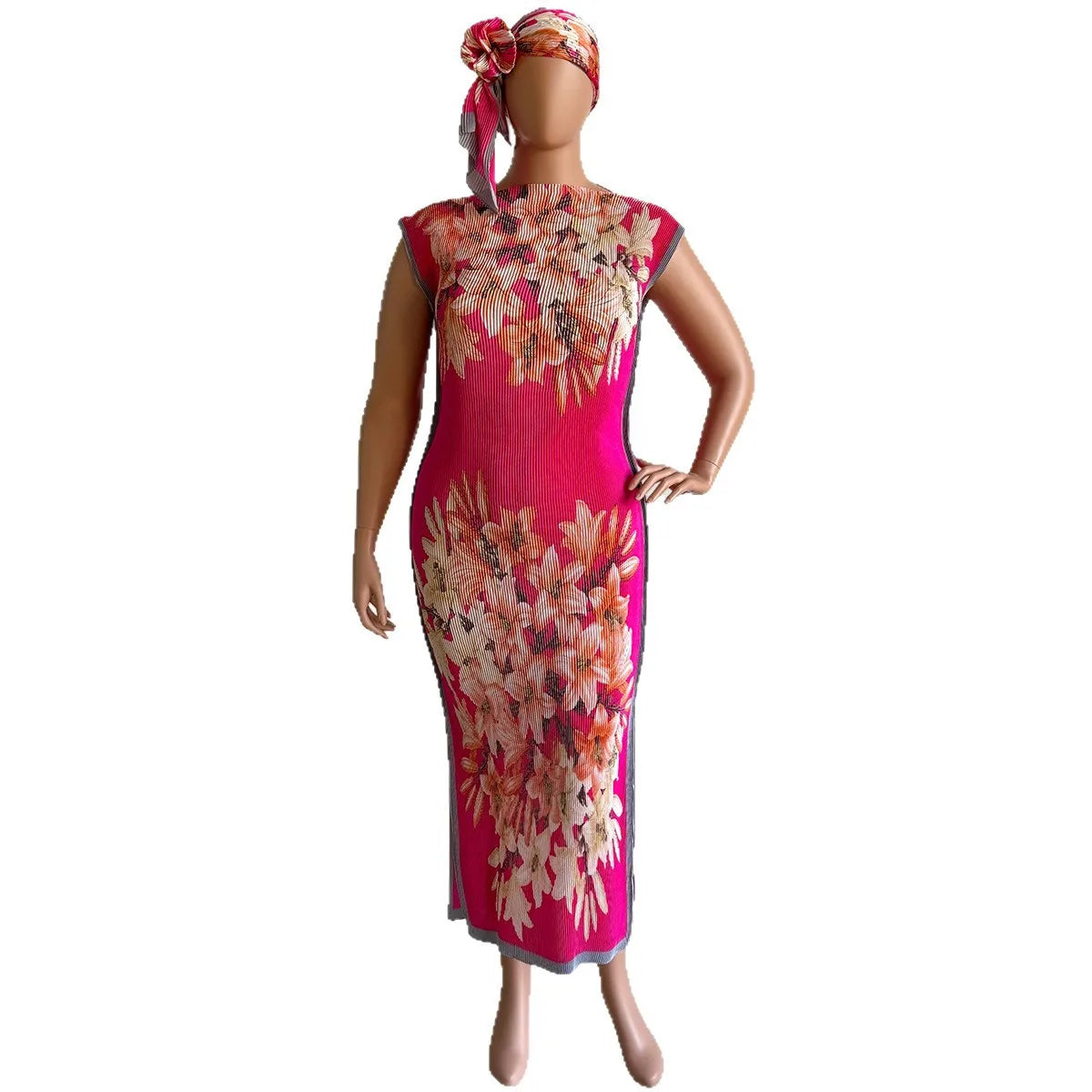 A plus size African silk printed two-piece set featuring a pink floral print top and matching skirt.