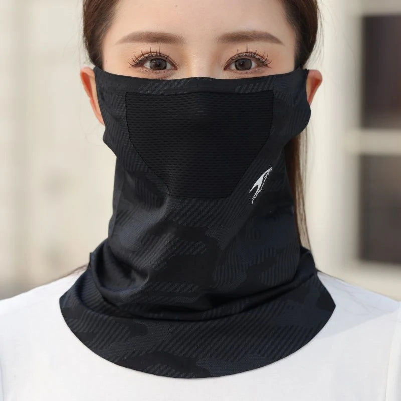 A woman wearing a black ice silk breathable face and neck gaiter