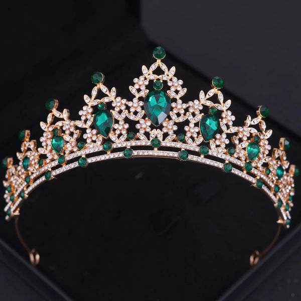Gold-toned crystal tiara crown hair accessories featuring emerald green gemstones and intricate filigree work.