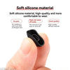 A hand is holding a black silicone ear tip for true wireless earbuds.