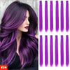 A woman models long purple hair extensions with vibrant violet and lavender shades.