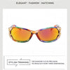 Orange und grün umwickelte Sonnenbrille mit goldener Zier und Schmetterlingsdetail
