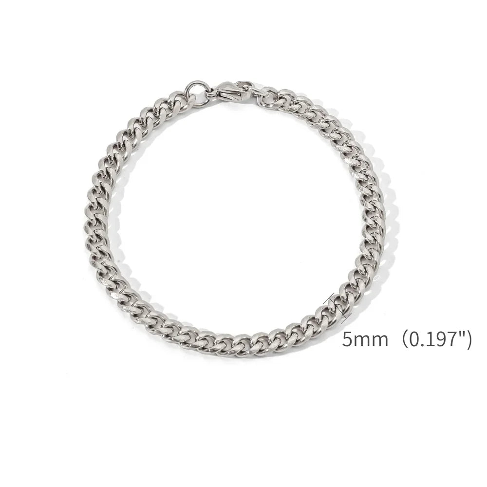 A silver stainless steel Cuban link bracelet shown against a white background.