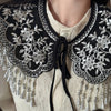 Chemise à col en dentelle noire avec broderie et franges argentées