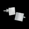 A pair of men's classic copper square cufflinks with a textured finish.