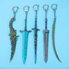 A set of five dark metal keychains featuring various fantasy swords and blades.