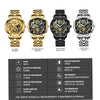 A collection of five stainless steel quartz wristwatches featuring gold, black, and silver finishes with luminous dials.