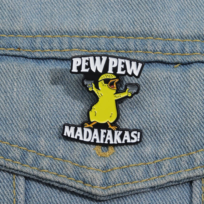 A yellow chicken enamel lapel pin featuring the text PEW PEW and MADAFAKAS!