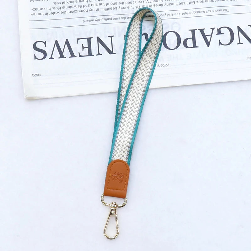 Premium Leder-Handgelenk-Lanyard und Schlüsselband mit blau-weißem Mustergewebe-Kordel.