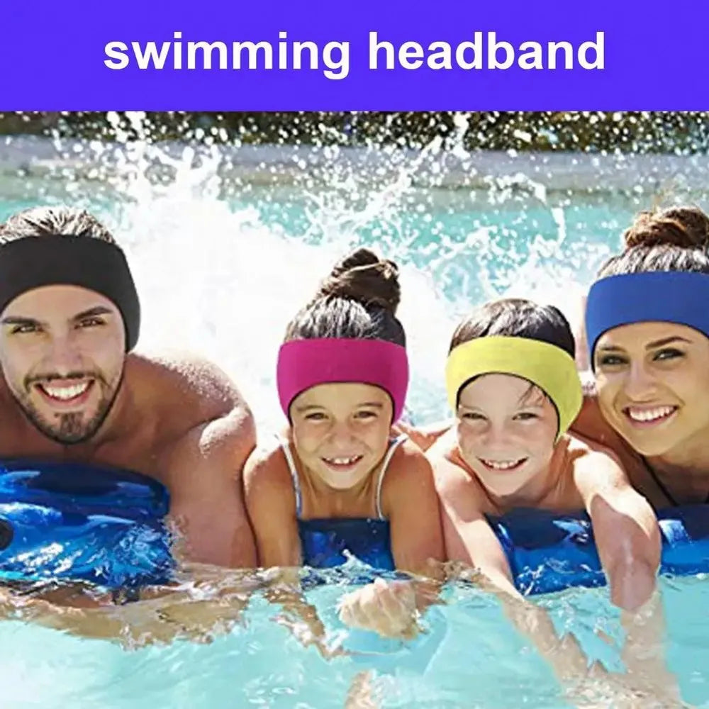 A group of people wearing swimming headbands enjoying water sports in a pool.