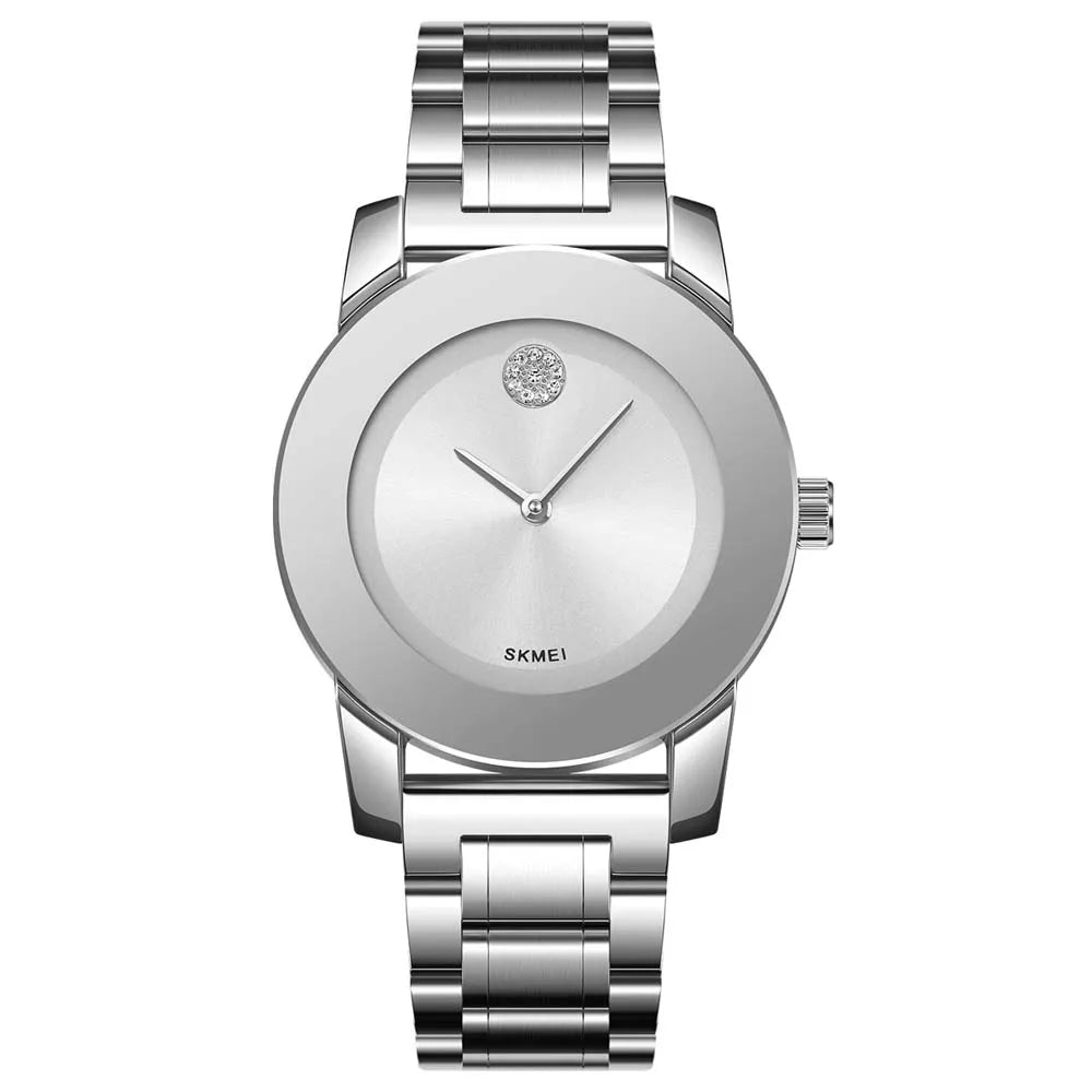 A silver minimalist quartz wristwatch with a round face and metal bracelet.