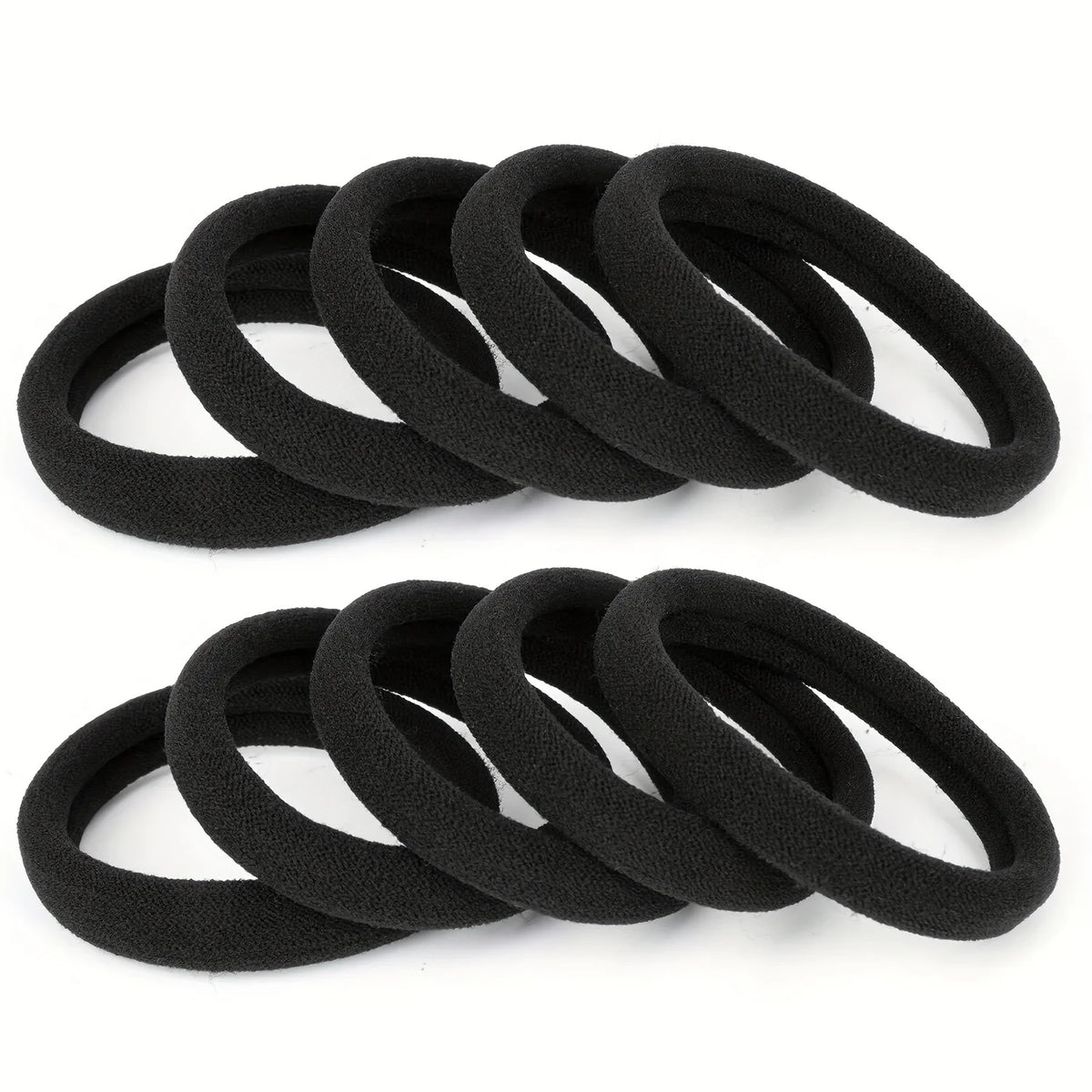 A stack of black seamless elastic hair ties or ponytail holders.