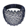 A dark blue crystal pearl floral beaded headband with a ruffled band.