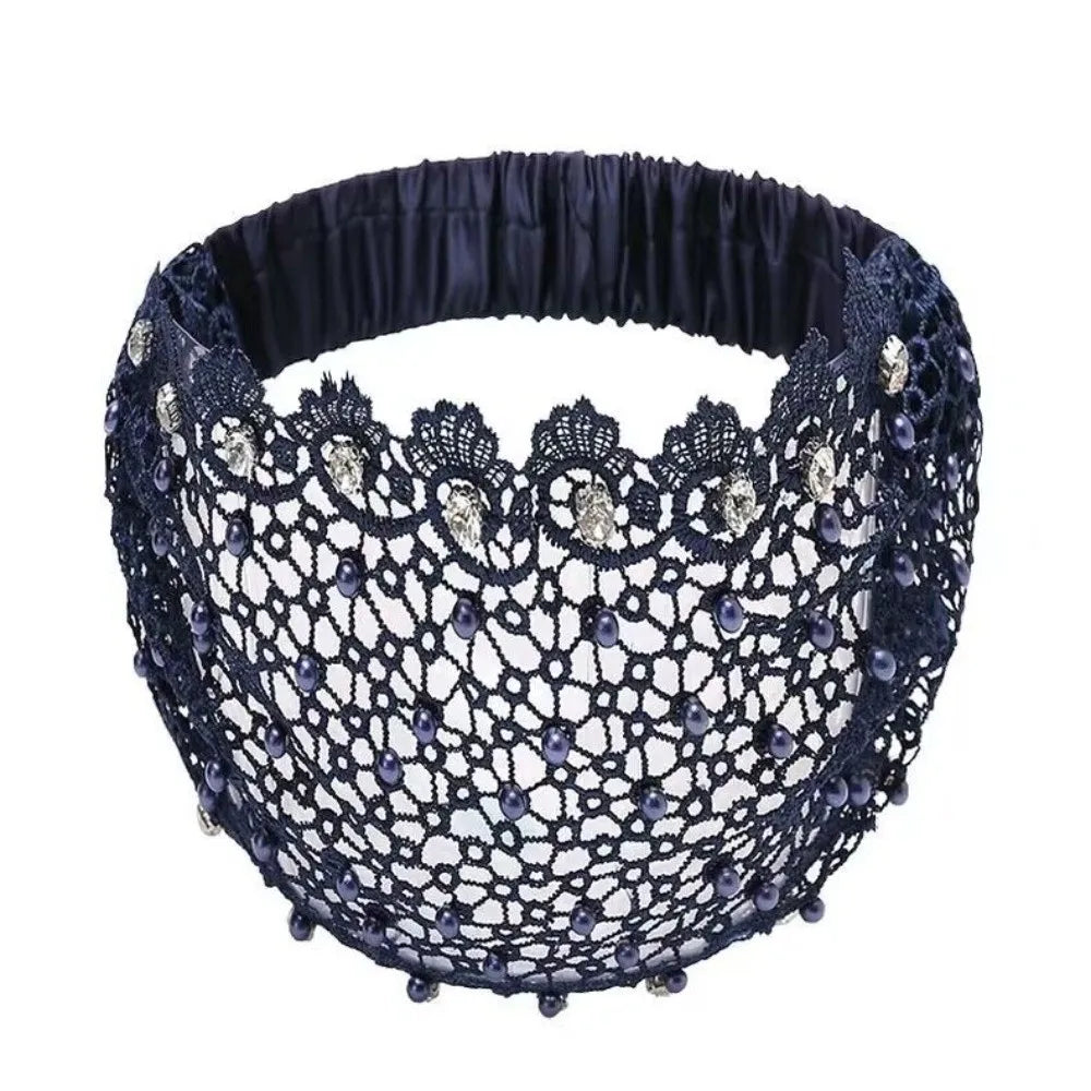 A dark blue crystal pearl floral beaded headband with a ruffled band.