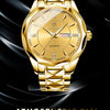 A close-up shot of a gold-toned watch with an atmospheric dial and modernist design set against a black background.
