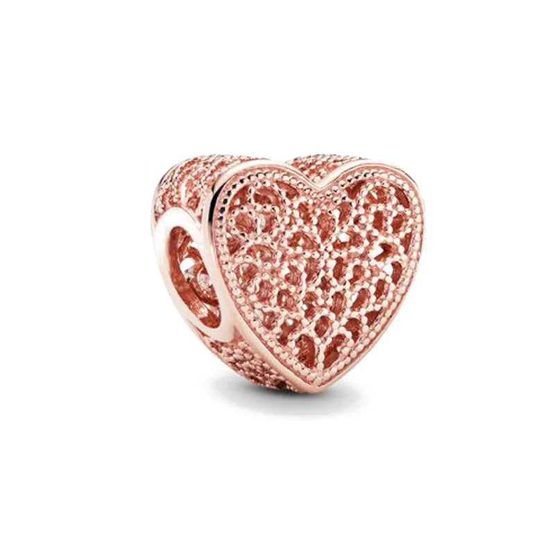 Rose gold heart-shaped charm pendant with a textured finish