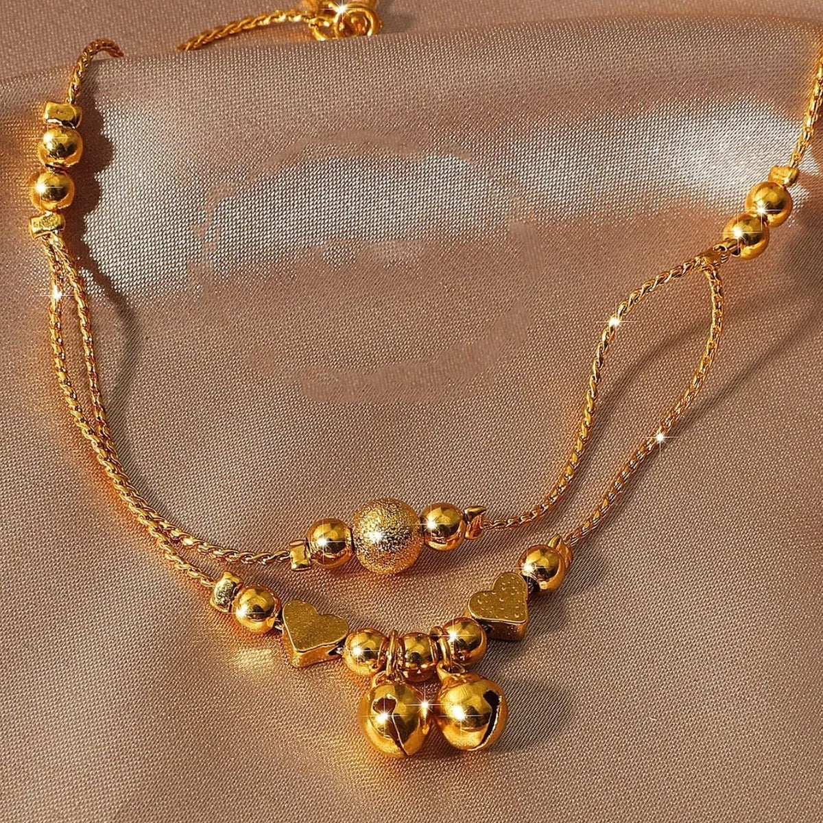 Gold-plated heart bell anklet for women with delicate chains and charms
