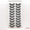 A strip of dramatic mink false eyelashes displayed on a clear plastic card.