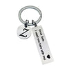 Silver keychain with a Z initial and engraved text that reads Drive Safe I need you here with me