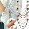 A close-up of multi-function magnetic clothing clips in various gold and silver chain styles.