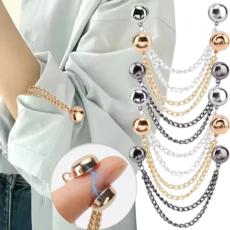 A close-up of multi-function magnetic clothing clips in various gold and silver chain styles.