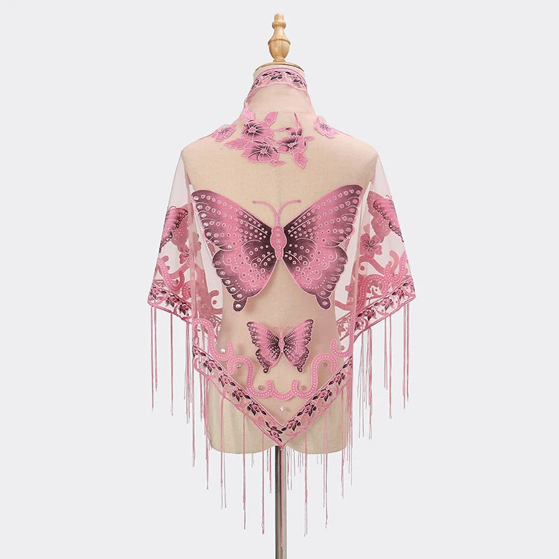 A sheer pink butterfly lace scarf shawl displayed on a mannequin.