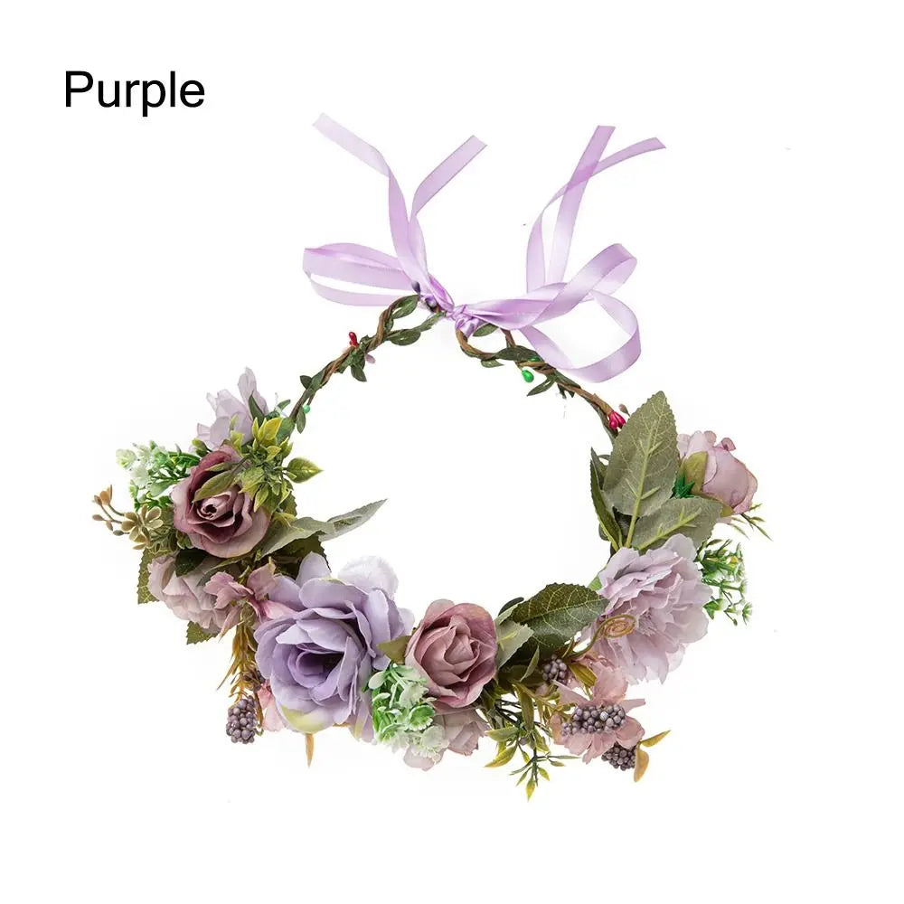 Purple bohemian flower headband featuring roses and greenery with lavender ribbons