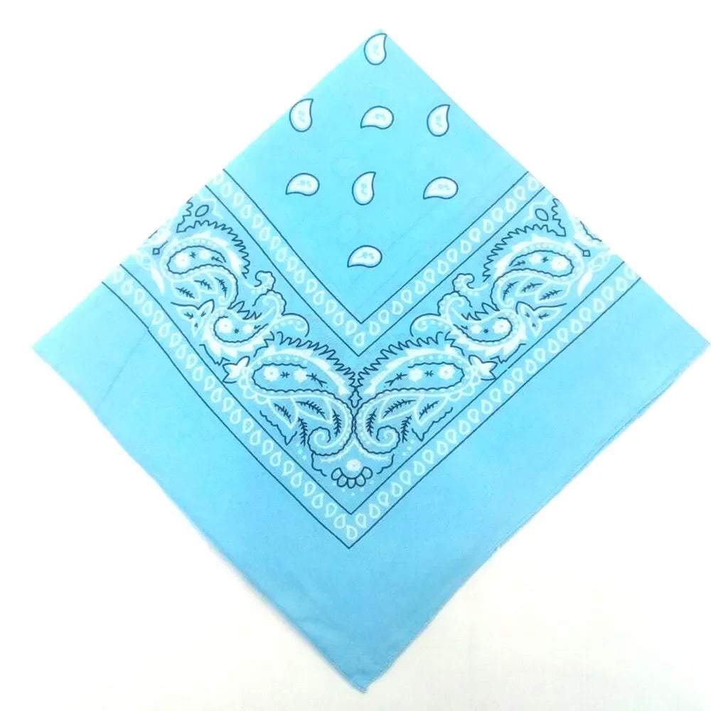 Light blue bandana featuring intricate white paisley and floral patterns